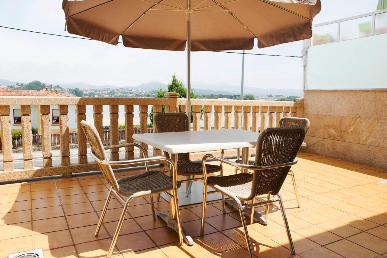 Apartamentos Ria De Bayona Байона Экстерьер фото
