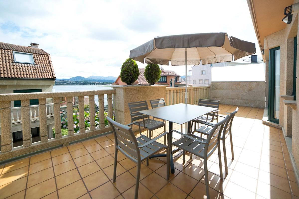 Apartamentos Ria De Bayona Байона Экстерьер фото